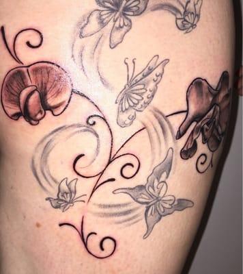 My sweet pea flowers were my newest addition by Empire (the butterflies are an older tattoo)