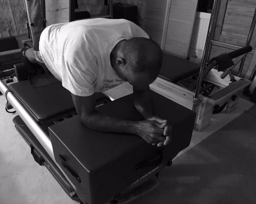 MP doing a modified long stretch on the reformer.