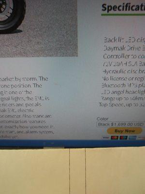 Very difficult to read the fine print!  I don't see the size of the motorcycle electric motor. 500 watts is grossly underpowered.