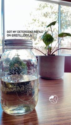 Mason jar filled with non-scented laundry detergent.