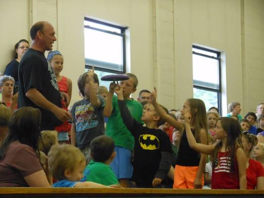 Spinning a Frisbee at the Williamston Library!