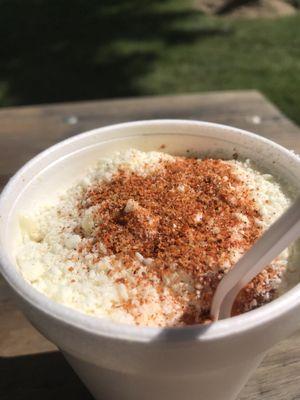 Cotija cheese and chili powder top the Esquite (aka "Corn in a Cup")