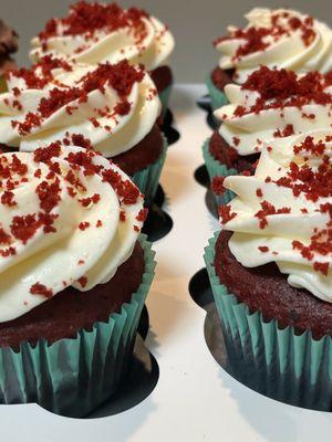 Customized redvelvet cupcake with whipped cream cheese frosting