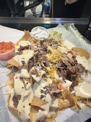 Steak nachos...disgusting!