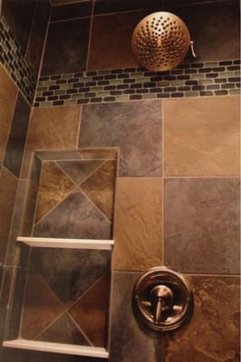 Custom tile shower! Huge walk-in with a seat