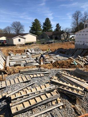 It may look like a mess but each panel is being placed with precision where it will be placed after the rebar reinforcements placed