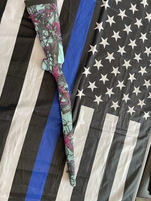 Foxy Lady Camo over a rifle stock