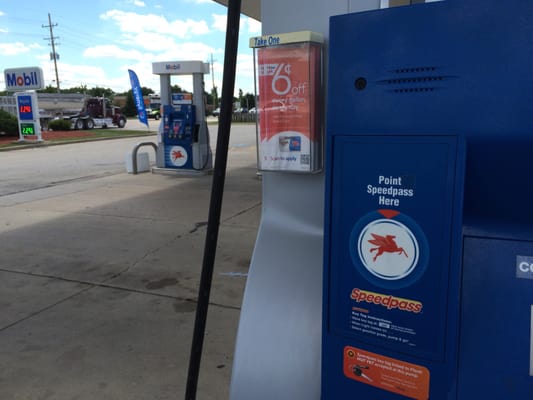 Pumps and sign on 59.