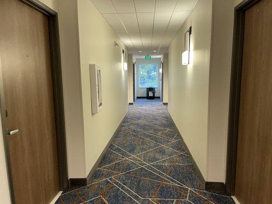 Sumner, WA - Candlewood Suites Hotel Sumner - Puyallup Area. Trash cans located at the end of each hall and at the elevator.