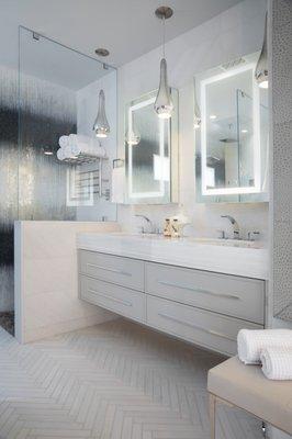 Glam Bathroom. Ombre Shower Wall. Herringbone Tile. Dura Supreme Custom Vanity.