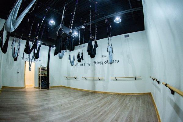 Our Play Studio holds our Aerial Roots and YogaBarre classes.