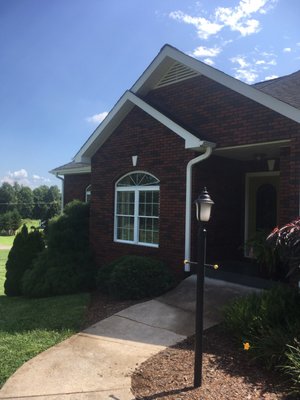 Pressure cleaning can be beneficial to brick homes as well, I cleaned the gutters, windows, eaves and soffits on this beautiful home.