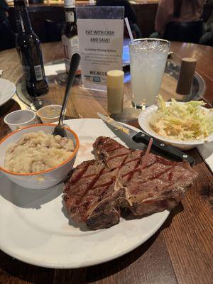 Porterhouse, garlic mash, side salad. I had a vodka lemonade to drink.