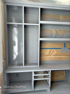 built in the wall office cabinet bookshelf after freshly being spray painted