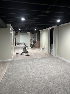 In progress Full basement remodel blacked out ceiling with recess lighting