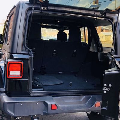 2020 Jeep Wrangler Unlimited /// Replaced grey cloth seats with vibrant red leather trim.