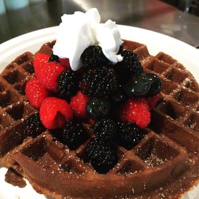 Nutella waffle with maple glazed mixed berries