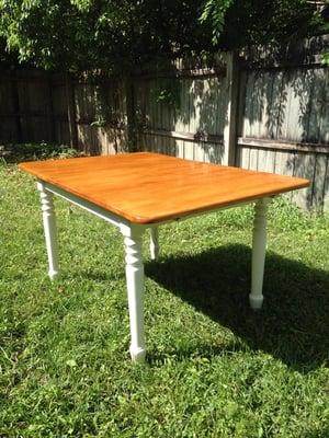 After refinishing the table and chairs I purchased for $36, here's the finished table!