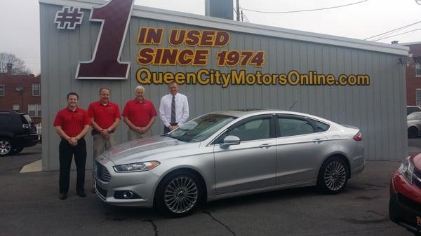 Queen City Motors sales staff
 (From left to right: Travis Wilson, Blaine Bridges, Matt Cline, Tim Uhl)