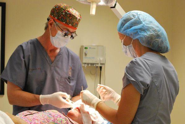 Dr Scott Rotatori at work performing cosmetic procedure.