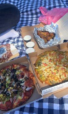 Deluxe Pizza, chicken pesto pizza , lemon pepper wings