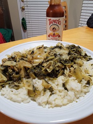 2nd Round of their Cabbage Greens (I cooked the Rice) Ran into a Problem. (Small peice of Plastic in the pic)