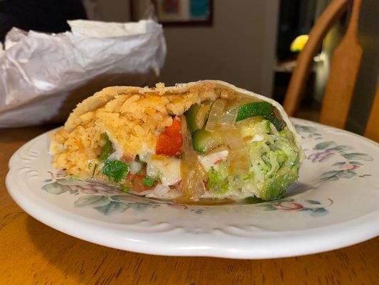 Vegetarian burrito-- rice, onion, lettuce, zucchini, tomato, mushroom