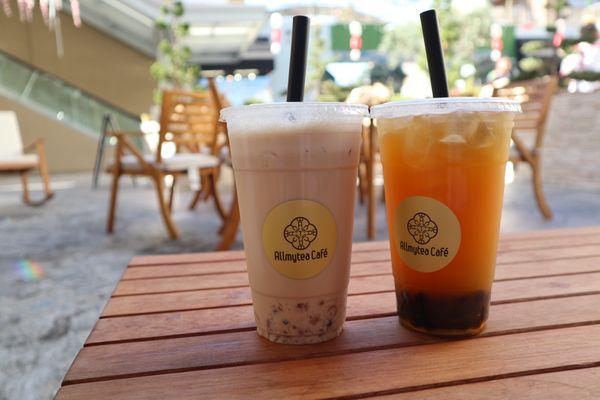 Outdoor table with Hokkaido Milk Tea with Crystal Boba, and Passion Island Tea with Boba.