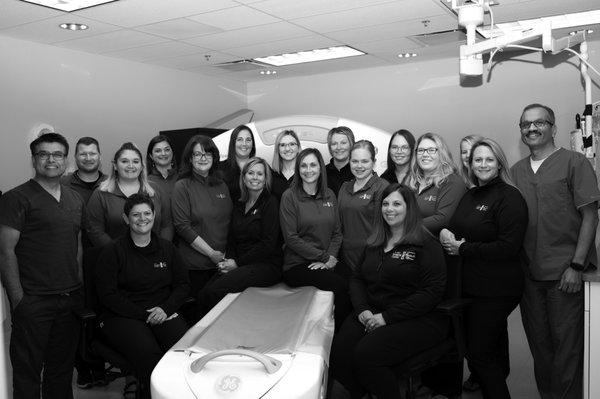 FJGK staff pictured with our CT scanner