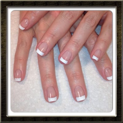 Beautiful natural nails with gel French manicure.