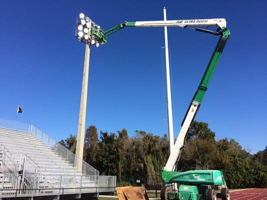 Repairing stadium lights at 90' up in the air