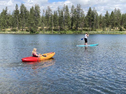 Single kayak and ceramic paddle board being used