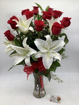 Dozen long stem red roses with white lilies