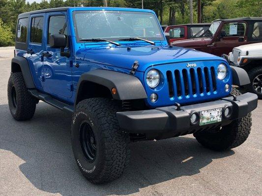 Lightning blue Unlimited with Rough Country 3.5" lift.