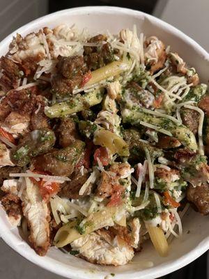 Basil Pesto Pasta with crispy chicken and italian sausage