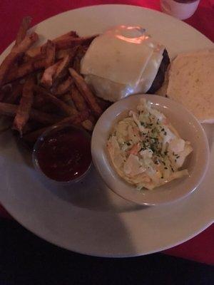 Regular cheese burger with side of fresh cut fries and cole slaw. Ordered medium well and was cooked correctly.