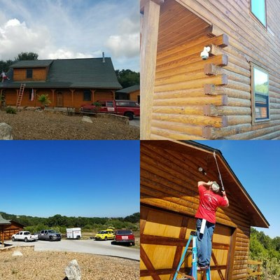 Pressure washing log cabin in Canyon Lake before applying stain