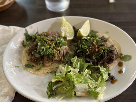 One carne asada and one pork taco