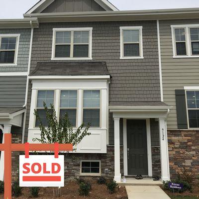 A very happy couple with their new construction townhouse.