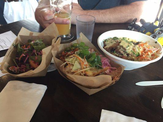 Beet salad, pork nachos, and smoked brisket poutine at Modest Brewing. It was so delicious. beet salad complimented the poutine.