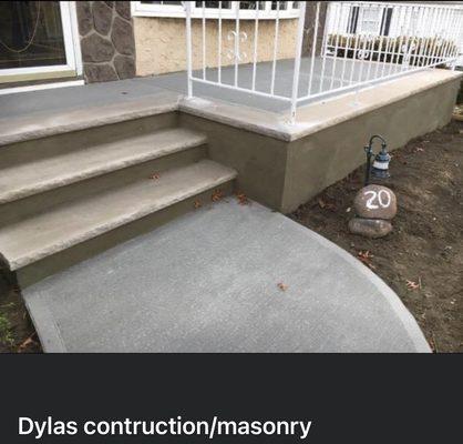 lime stone  and concrete front porch