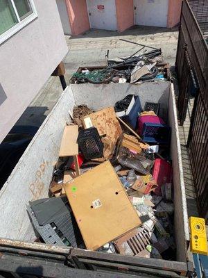 Trash removal hauling clean up garage and demolition trash removal