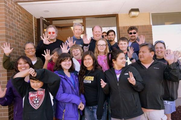 Group photo from the launch party. Many hands at Lima Hana!