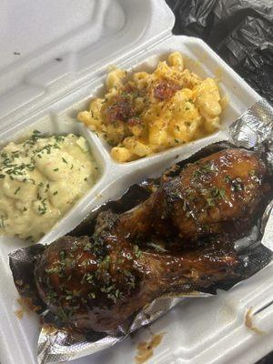 Chicken legs, Mac & cheese, and potato salad