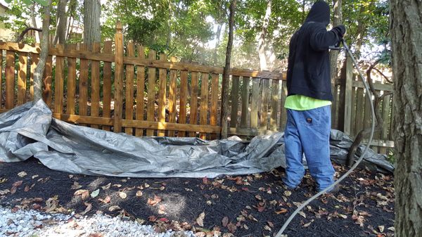 Power washing fence prior to applying semi transparent wood stain paint