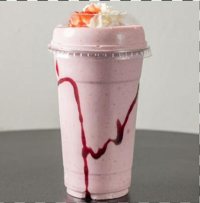 Strawberry Impact- Blended in almond milk...fresh strawberries, vanilla , strawberry protein, and ice. Topped with whipped cream or plain!