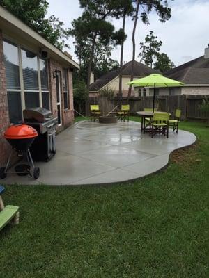 500 sq ft patio with fire pit and decorative sawing