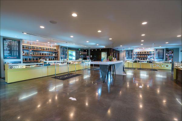 TOKYO STARFISH Southern Bend, Oregon main interior looking at interior counters and flower wall displays.