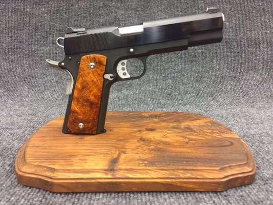 Custom built and hand fit 1911 on a Caspian slide and frame.