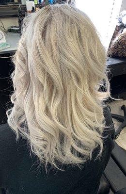 Cool blonde color with root melt